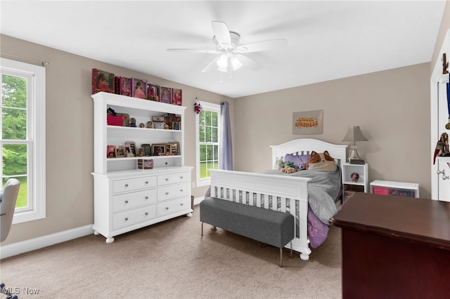 3202 S Lipkey Rd, North Jackson, OH 44451 - carpeted bedroom with ceiling fan and baseboards