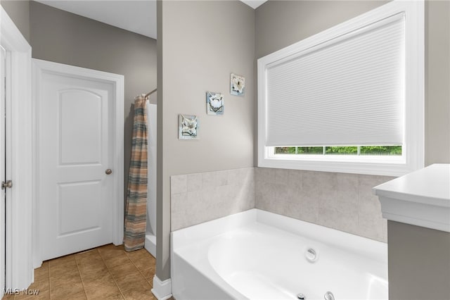 3202 S Lipkey Rd, North Jackson, OH 44451 - bathroom with a whirlpool tub, tile patterned flooring, and a shower with shower curtain