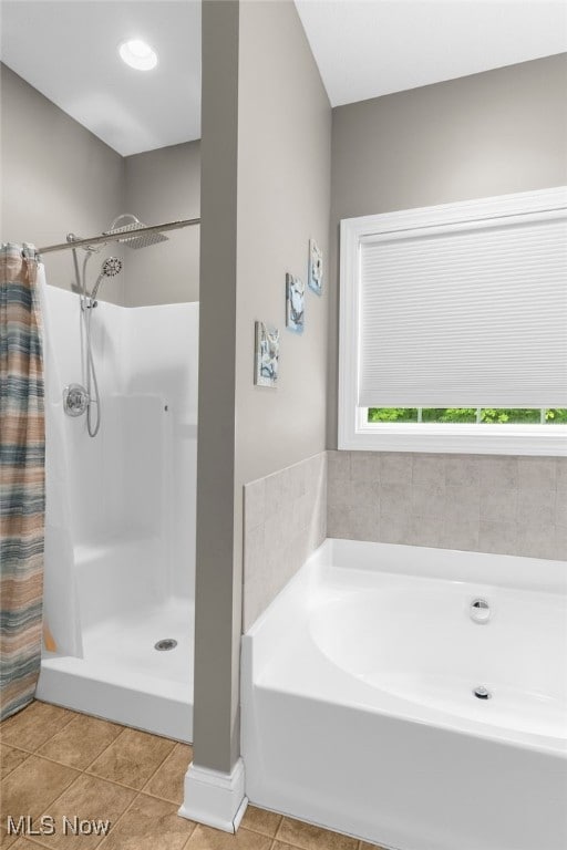 3202 S Lipkey Rd, North Jackson, OH 44451 - bathroom featuring curtained shower, a garden tub, and tile patterned floors