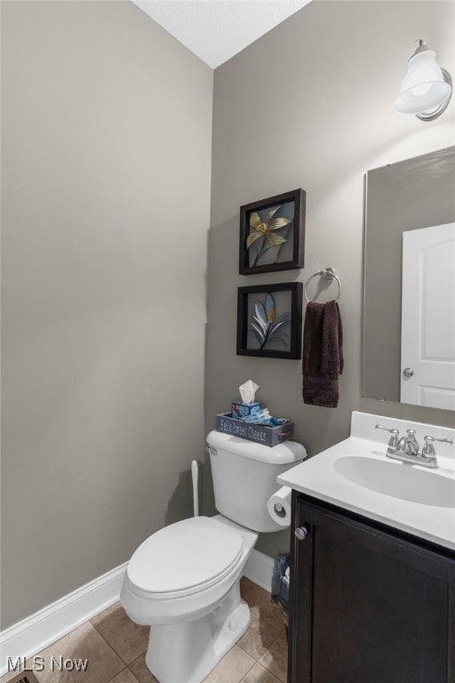 3202 S Lipkey Rd, North Jackson, OH 44451 - half bathroom with vanity and tile patterned floors