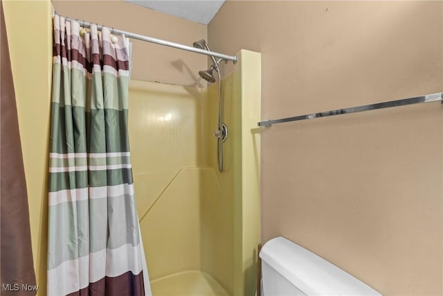 53979 Colerain Pike, Martins Ferry, OH 43935 - bathroom featuring curtained shower and toilet