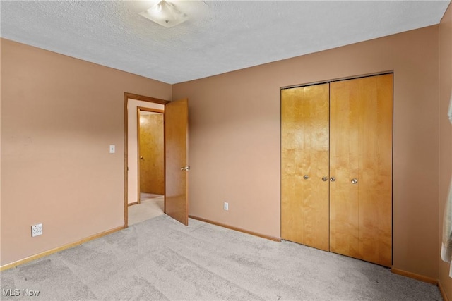 53979 Colerain Pike, Martins Ferry, OH 43935 - unfurnished bedroom with carpet, a closet, and a textured ceiling