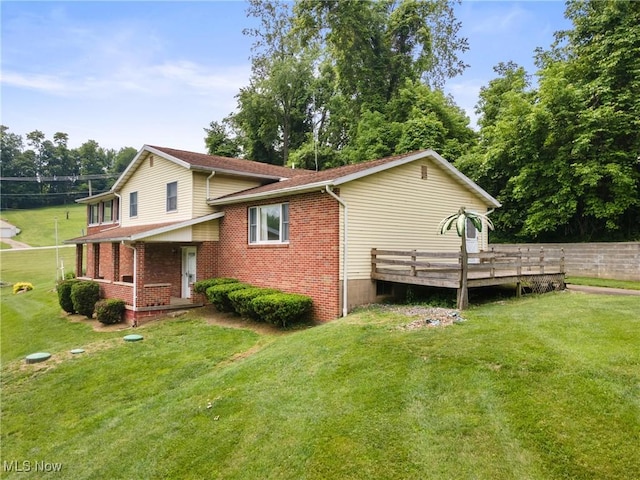 53979 Colerain Pike, Martins Ferry, OH 43935 - view of side of property featuring a lawn, brick siding, and covered porch