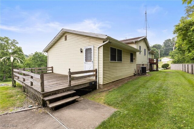 53979 Colerain Pike, Martins Ferry, OH 43935 - view of side of property featuring a wooden deck and a lawn