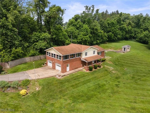 53979 Colerain Pike, Martins Ferry, OH 43935 - aerial view of property and surrounding area featuring a heavily wooded area