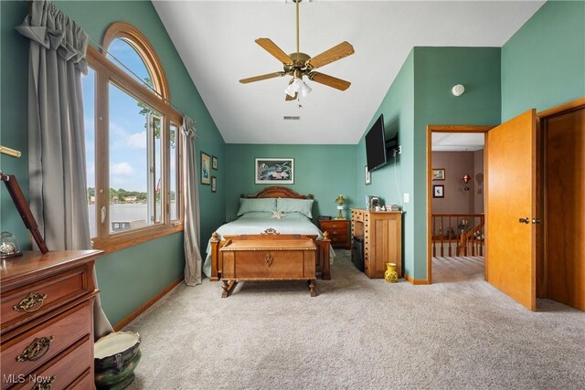 4869 Coleman Dr, Akron, OH 44319 - carpeted bedroom featuring high vaulted ceiling and a ceiling fan
