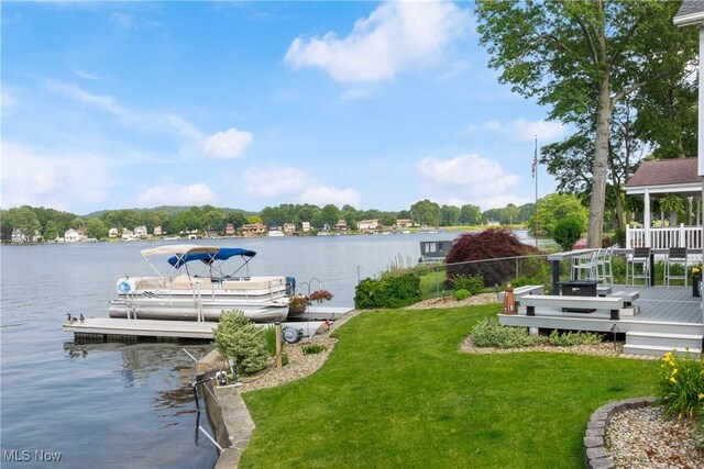 4869 Coleman Dr, Akron, OH 44319 - dock with a lawn and a water view