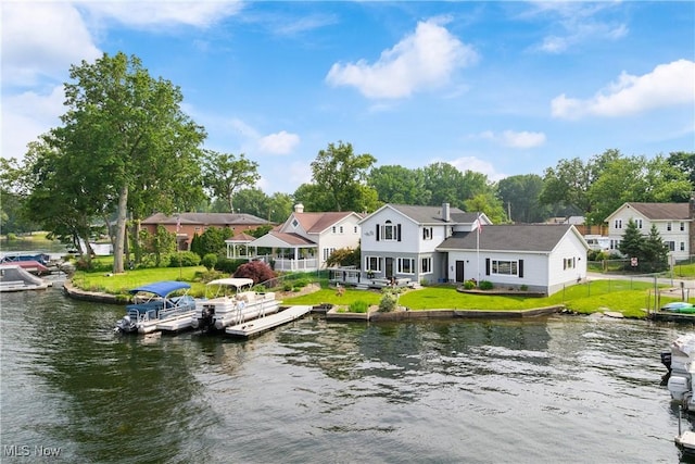 4869 Coleman Dr, Akron, OH 44319 - rear view of property featuring a water view and uncovered parking
