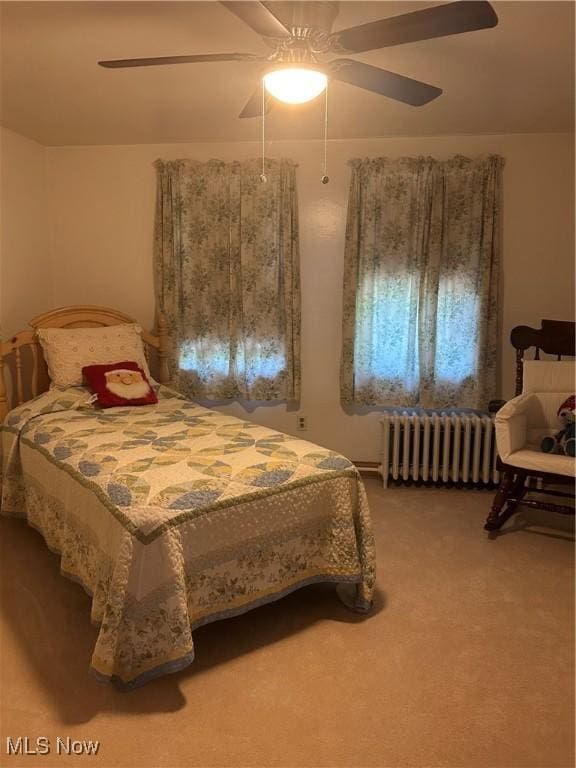 3601 State St, Weirton, WV 26062 - carpeted bedroom featuring radiator and ceiling fan