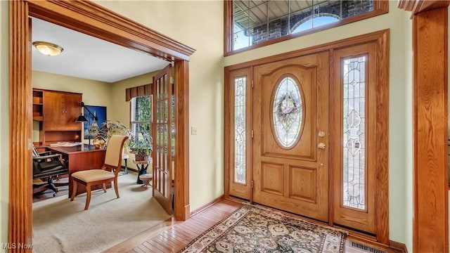 14751 Lancelot Ln E, North Royalton, OH 44133 - foyer featuring baseboards and wood finished floors