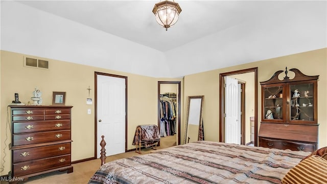 14751 Lancelot Ln E, North Royalton, OH 44133 - bedroom with light carpet, a closet, and lofted ceiling