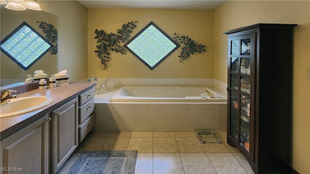 14751 Lancelot Ln E, North Royalton, OH 44133 - bathroom featuring vanity, a bath, and tile patterned floors