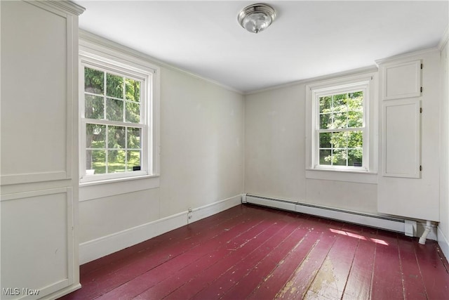 2132 Martin Rd, Mogadore, OH 44260 - unfurnished room featuring a baseboard radiator, dark wood finished floors, and plenty of natural light