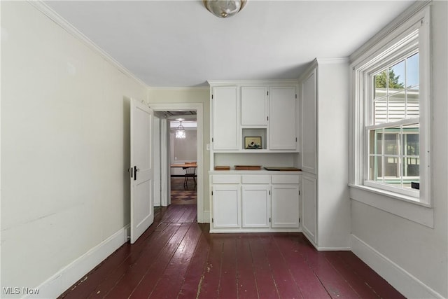 2132 Martin Rd, Mogadore, OH 44260 - kitchen featuring dark wood-style floors, white cabinetry, and crown molding