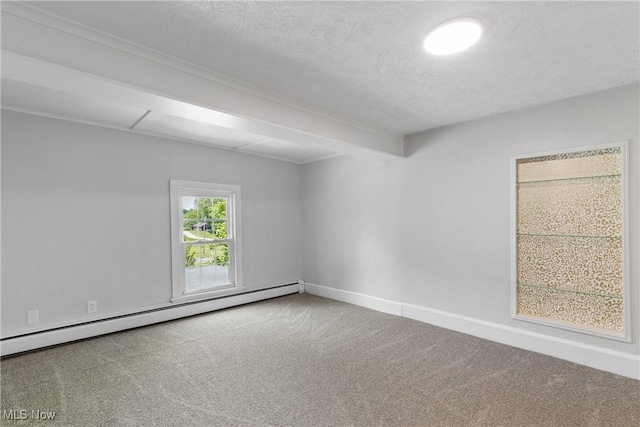 2132 Martin Rd, Mogadore, OH 44260 - carpeted spare room featuring a baseboard heating unit and a textured ceiling