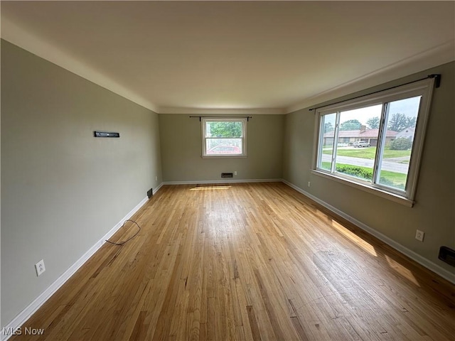 814 Almasy Dr, Campbell, OH 44405 - spare room with wood finished floors and baseboards