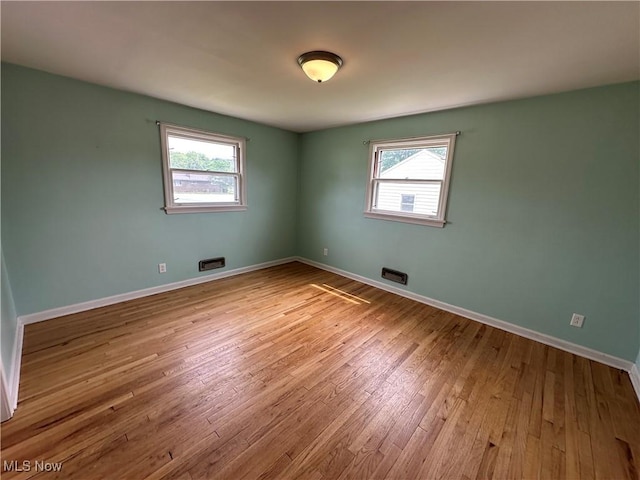 814 Almasy Dr, Campbell, OH 44405 - unfurnished room featuring hardwood / wood-style flooring and baseboards