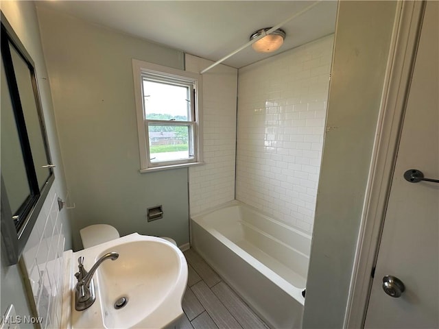 814 Almasy Dr, Campbell, OH 44405 - bathroom with a sink and bathtub / shower combination