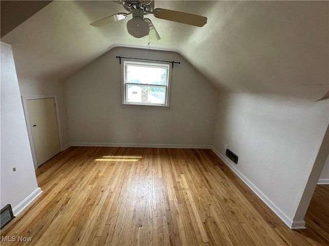 814 Almasy Dr, Campbell, OH 44405 - additional living space with a ceiling fan, light wood finished floors, and vaulted ceiling