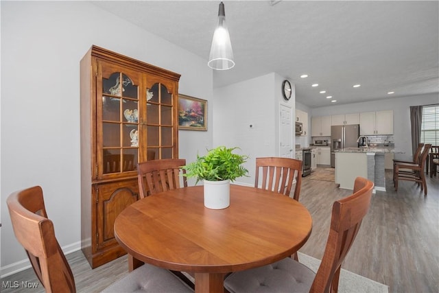 221 Kensington Way, Elyria, OH 44035 - dining room featuring light wood-style flooring and recessed lighting