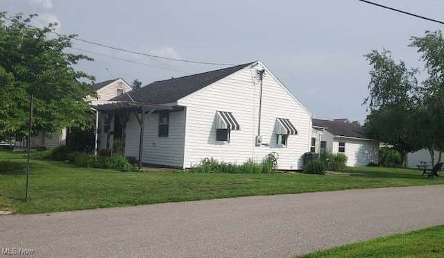 300 37th St, Vienna, WV 26105 - view of home's exterior featuring a lawn