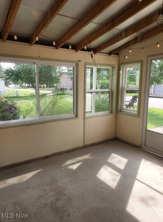 300 37th St, Vienna, WV 26105 - unfurnished sunroom featuring beamed ceiling and baseboards