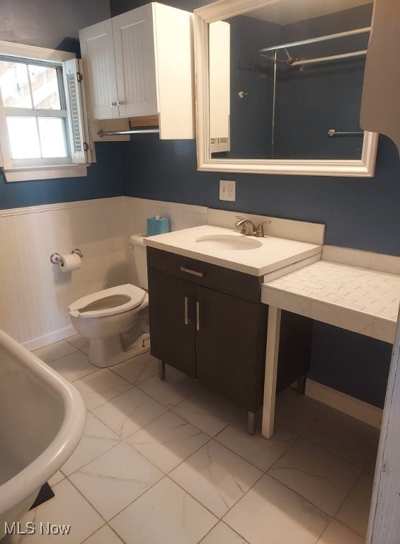 300 37th St, Vienna, WV 26105 - full bath with wainscoting, vanity, a shower, and marble finish flooring