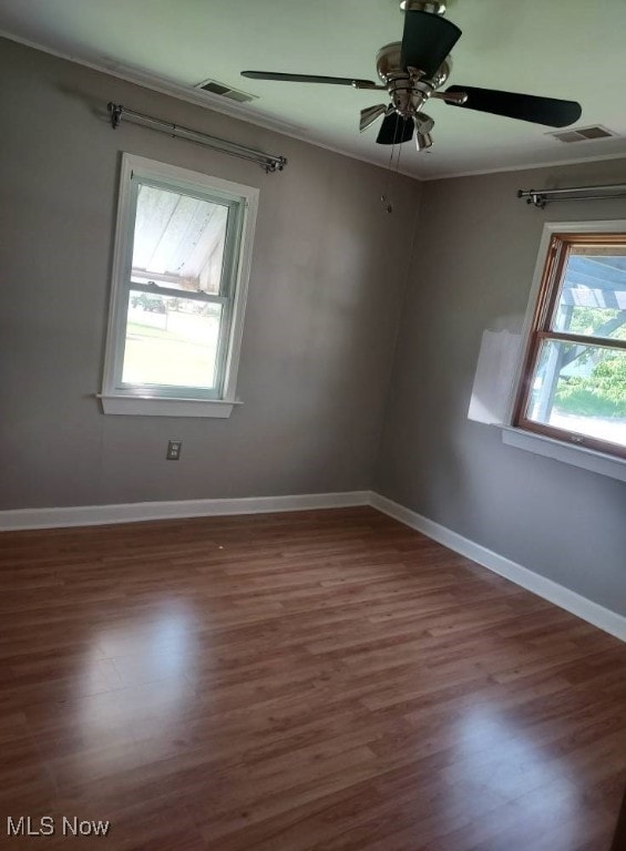 300 37th St, Vienna, WV 26105 - empty room with crown molding, wood finished floors, and ceiling fan