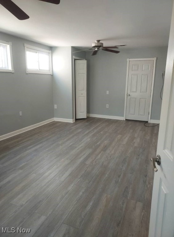 300 37th St, Vienna, WV 26105 - spare room with a ceiling fan and dark wood-style flooring