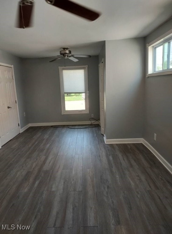 300 37th St, Vienna, WV 26105 - spare room featuring dark wood-style flooring and a ceiling fan
