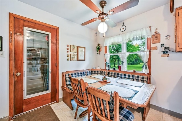 14860 Stoltz Rd, Diamond, OH 44412 - dining area with a ceiling fan and baseboards
