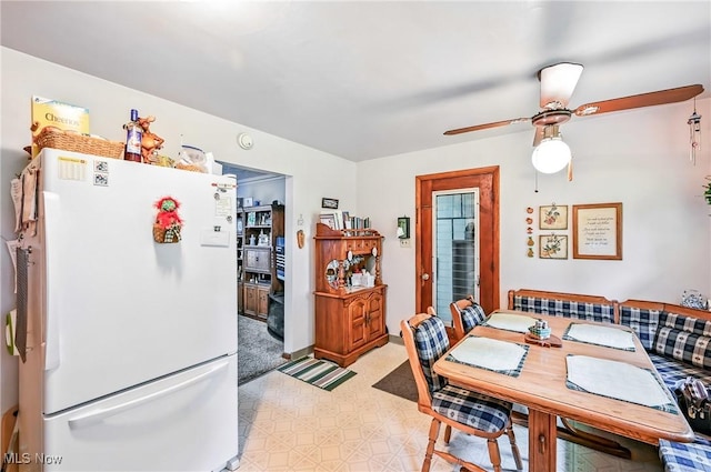 14860 Stoltz Rd, Diamond, OH 44412 - dining space featuring light floors and ceiling fan