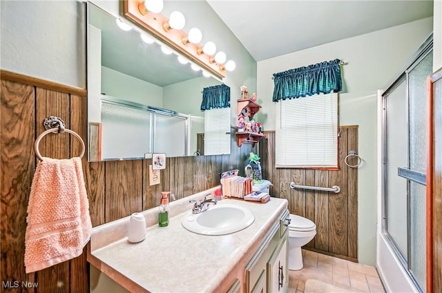14860 Stoltz Rd, Diamond, OH 44412 - bathroom featuring vanity, wainscoting, tile patterned floors, and bath / shower combo with glass door