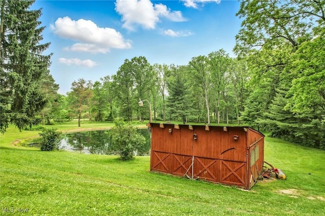 14860 Stoltz Rd, Diamond, OH 44412 - view of outbuilding with a water view and a wooded view