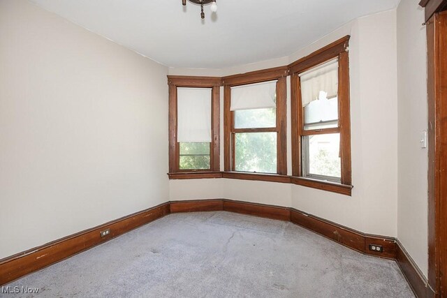 627 E 126th St, Cleveland, OH 44108 - carpeted spare room featuring baseboards