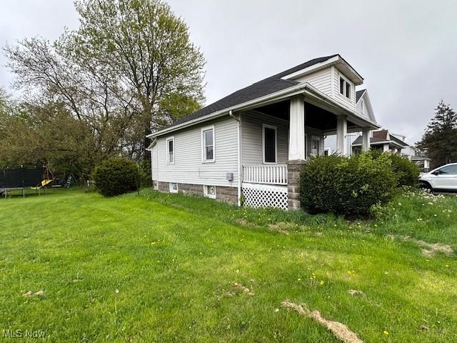 6108 Gateway Blvd S, Elyria, OH 44035 - view of side of property with a yard