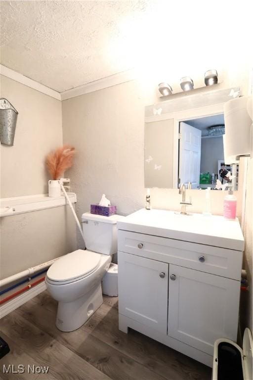 148 Summerberry Ln, Niles, OH 44446 - half bath featuring wood finished floors, vanity, a textured ceiling, and crown molding