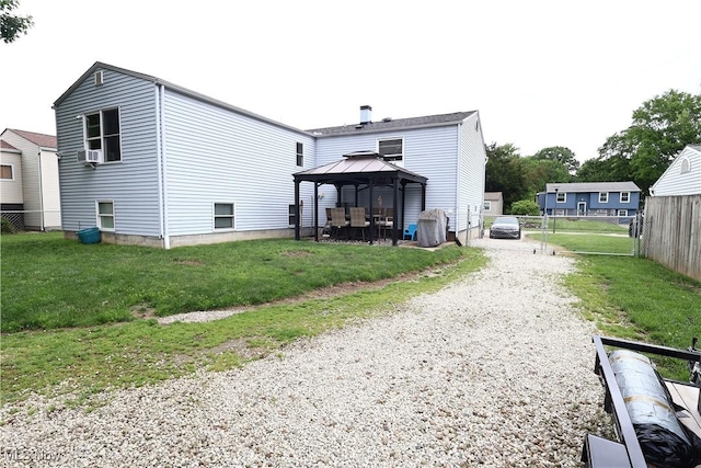 148 Summerberry Ln, Niles, OH 44446 - rear view of property with a gazebo and gravel driveway