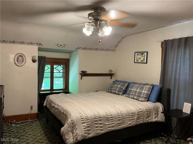 136 High St SE, Canal Fulton, OH 44614 - bedroom featuring a ceiling fan and vaulted ceiling
