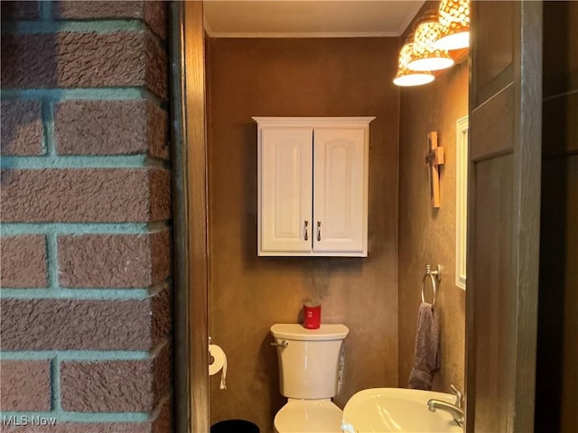 136 High St SE, Canal Fulton, OH 44614 - bathroom with a sink and ornamental molding