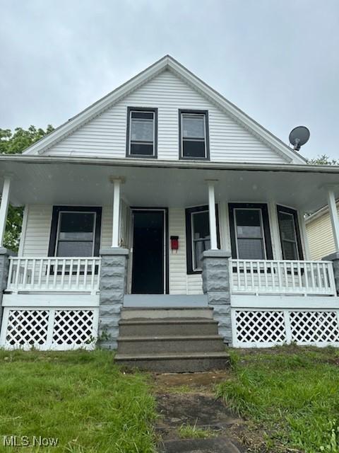 8910 Harris Ave, Cleveland, OH 44104 - bungalow-style house featuring covered porch