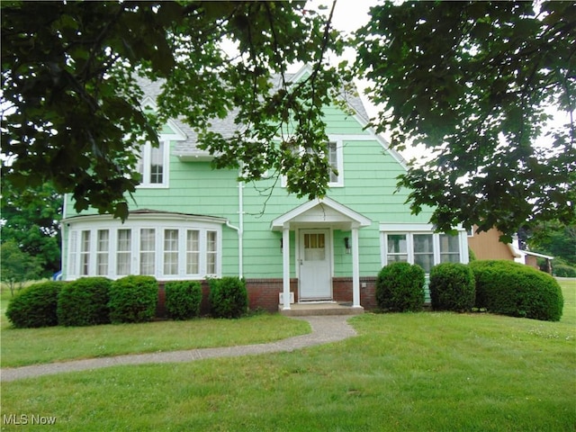 4017 N Ridge Rd W, Saybrook, OH 44004 - view of front facade featuring a front yard
