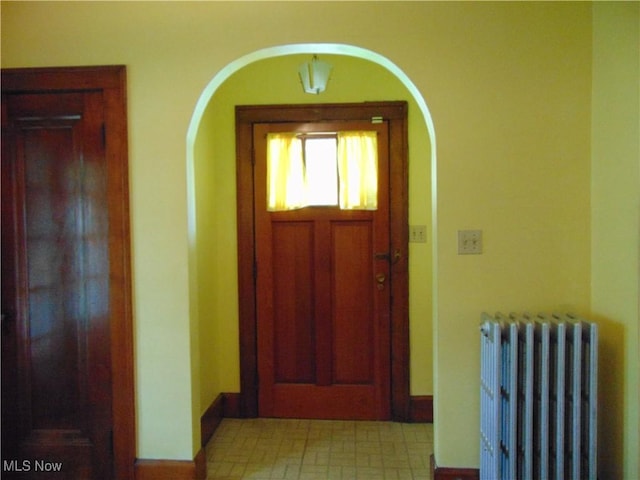 4017 N Ridge Rd W, Saybrook, OH 44004 - entryway featuring radiator and arched walkways