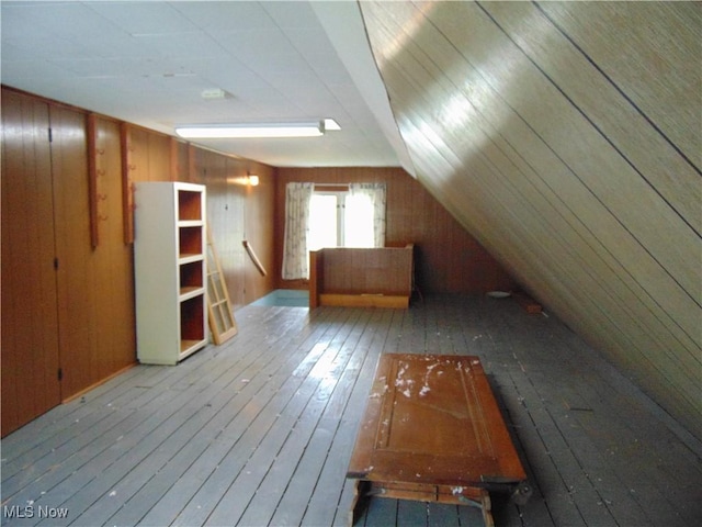 4017 N Ridge Rd W, Saybrook, OH 44004 - bonus room with hardwood / wood-style floors, wood walls, and vaulted ceiling