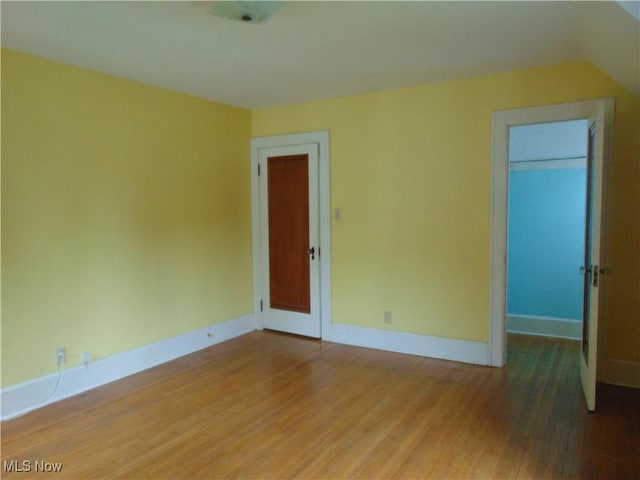 4017 N Ridge Rd W, Saybrook, OH 44004 - unfurnished room featuring light wood finished floors and lofted ceiling