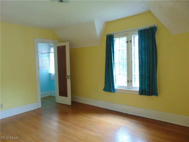 4017 N Ridge Rd W, Saybrook, OH 44004 - additional living space featuring vaulted ceiling and wood finished floors