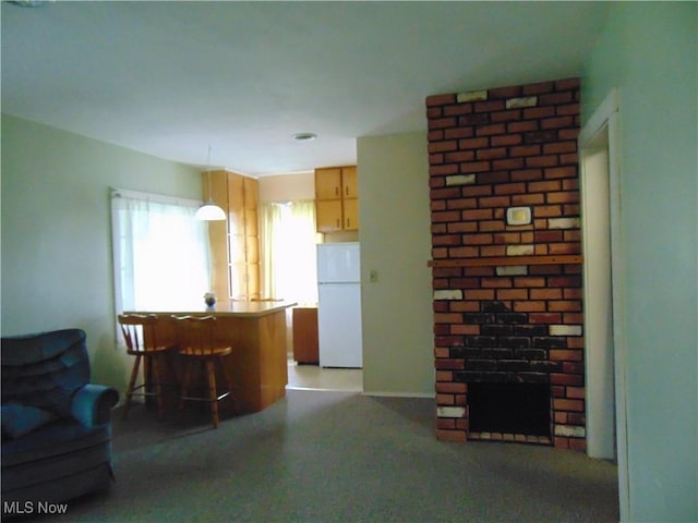 4017 N Ridge Rd W, Saybrook, OH 44004 - living room with a brick fireplace