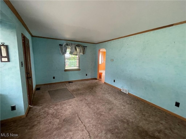 530 Center St, Hubbard, OH 44425 - carpeted spare room with crown molding and arched walkways