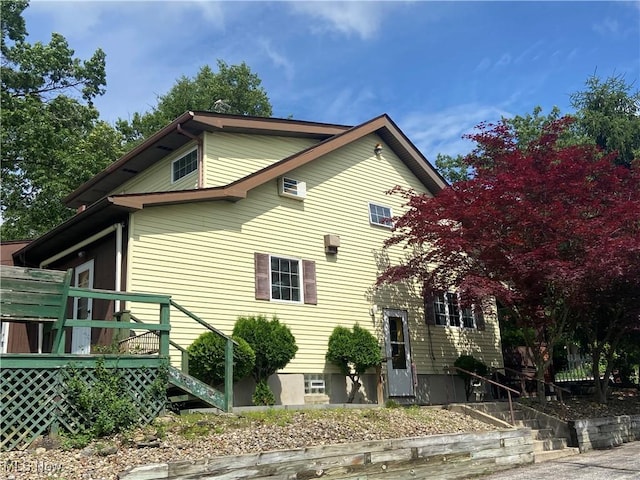 4520 E Wallings Rd, Broadview Heights, OH 44147 - view of home's exterior featuring stairway and a deck