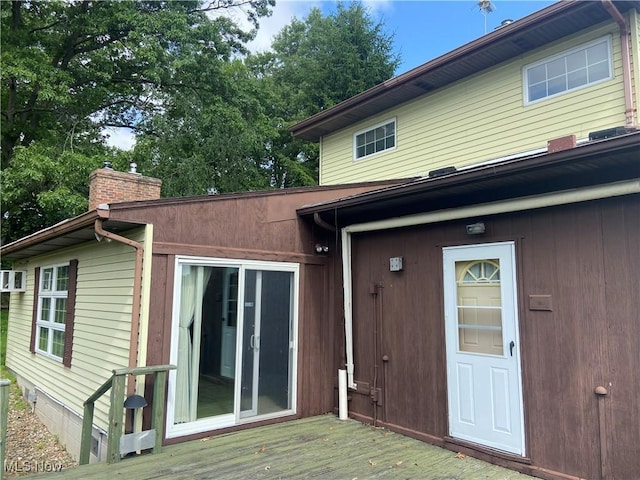 4520 E Wallings Rd, Broadview Heights, OH 44147 - back of house with a chimney and a wooden deck